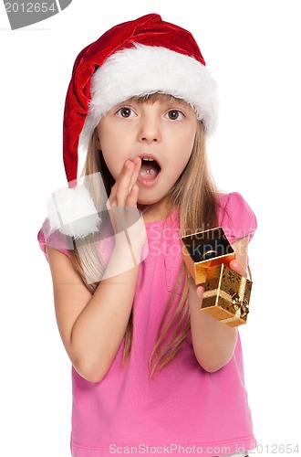 Image of Little girl with gift box