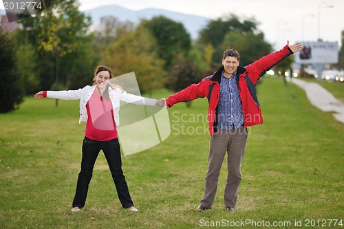 Image of happy couple outdoor