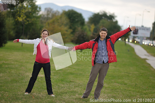 Image of happy couple outdoor