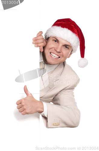 Image of Portrait of man in santa hat