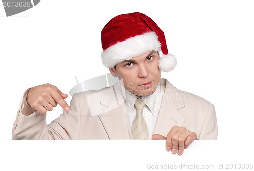 Image of Portrait of man in santa hat