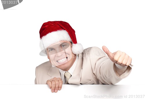 Image of Portrait of man in santa hat