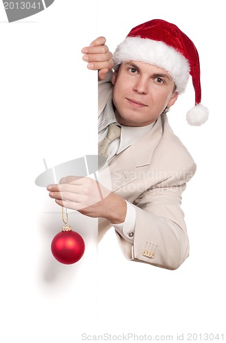 Image of Portrait of man in santa hat