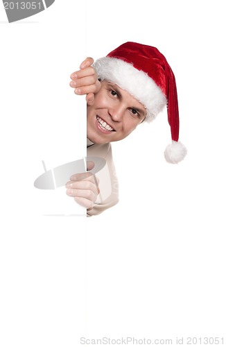 Image of Portrait of man in santa hat