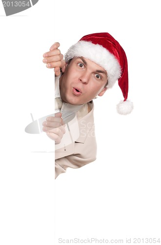 Image of Portrait of man in santa hat