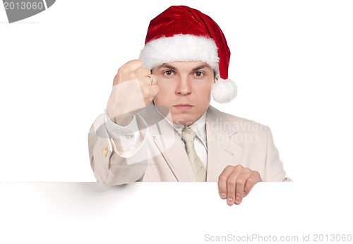 Image of Portrait of man in santa hat