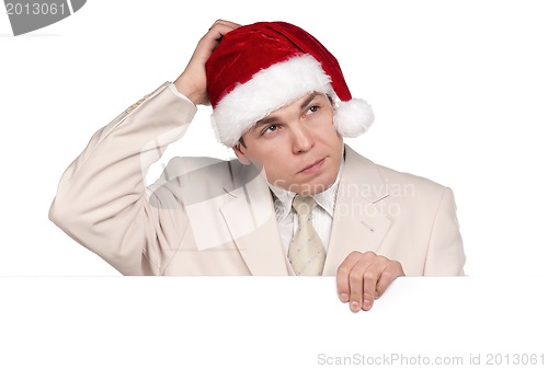 Image of Portrait of man in santa hat