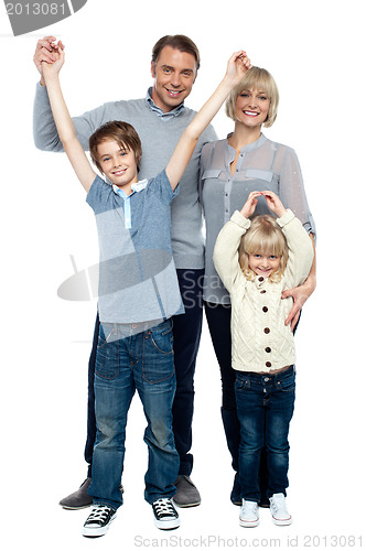Image of Playful kids with parents. Family portrait