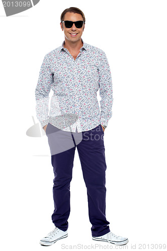 Image of Stylish middle aged man posing in casuals