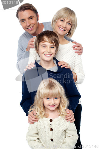 Image of Complete family. Daughter, son, mother and father