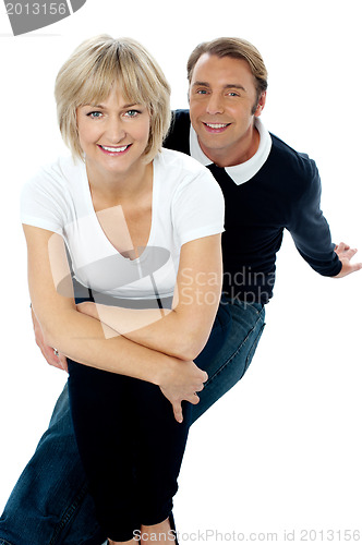 Image of Beautiful lady sitting on his man's lap