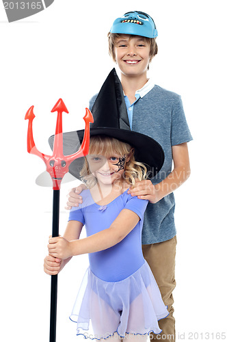 Image of Boy and girl wearing halloween costume