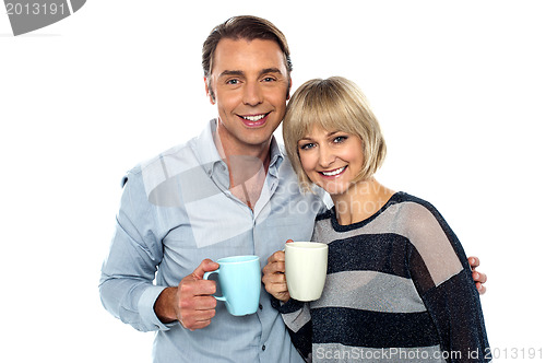 Image of Couple starting their day with a cup of coffee