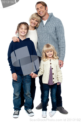 Image of Cheerfully winter wear family of four. Stay protected