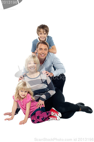 Image of Closely bonded family in a studio