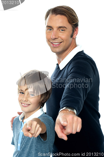 Image of Charming father and son pointing at you