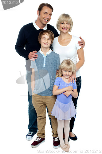 Image of Indoor studio shot of lovely family, four members