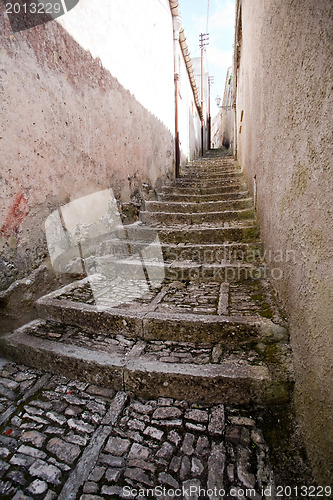 Image of medieval street with stone stairway closeup