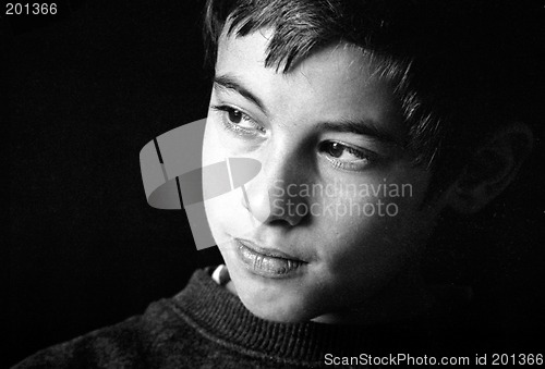 Image of Boy  by a window