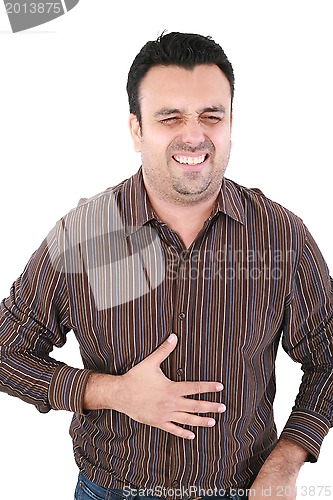 Image of Young man suffering from a bad stomach ache pain isolated on whi