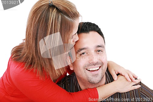 Image of Beautiful woman kisses her husband, isolated on white