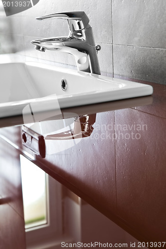 Image of Faucet reflection