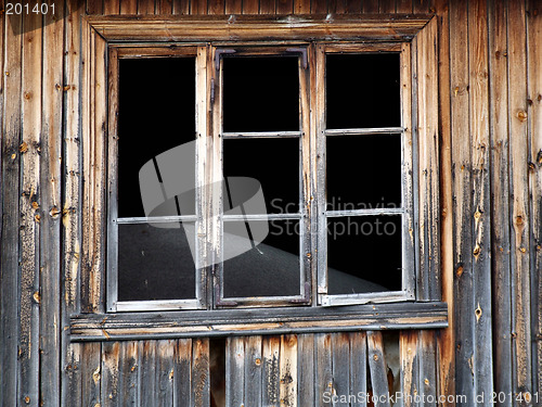 Image of Blind window of abandoned house