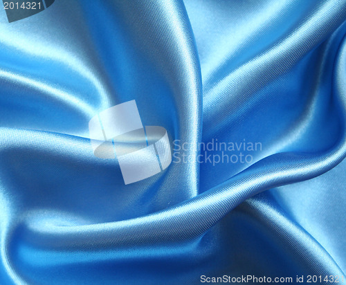 Image of Smooth elegant blue silk as background