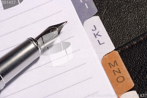 Image of Pen and Notepad