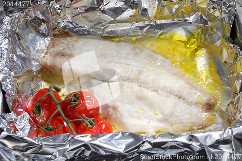 Image of Baking fish and tomatoes
