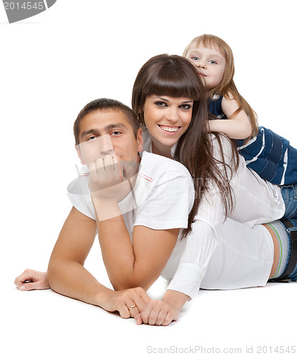 Image of Happy family looking at the camera on their floor