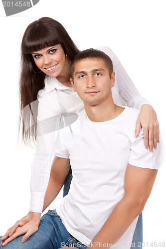 Image of Portrait of happy young couple, hugging, smiling.?