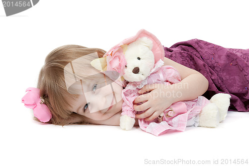 Image of a little girl 4 years old with a plush toy bear