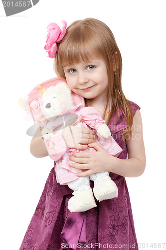 Image of portrait of a little girl 4 years old with a plush toy