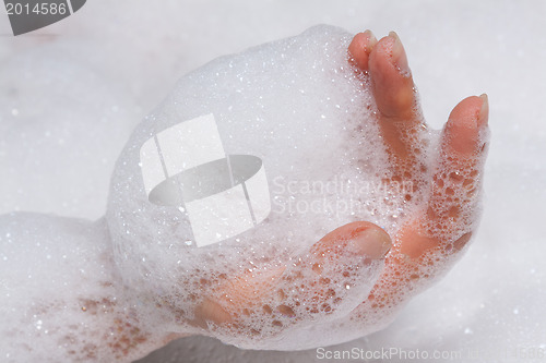 Image of hand in suds
