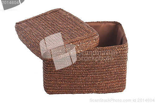 Image of decorative brown wicker basket with lid