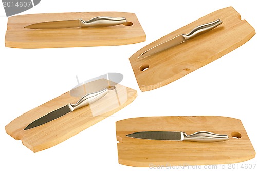 Image of table knife and wooden cutting board