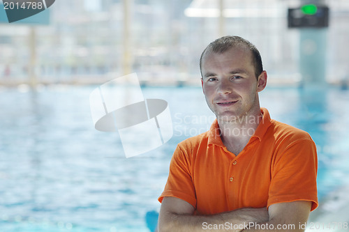 Image of happy child group  at swimming pool