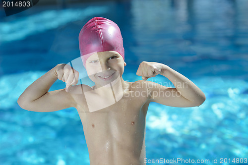 Image of happy child on swimming pool
