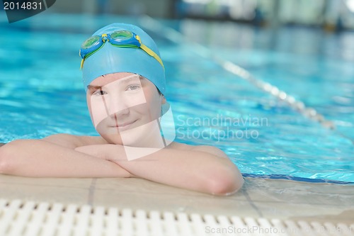 Image of happy child on swimming pool