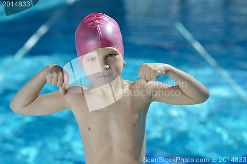 Image of happy child on swimming pool