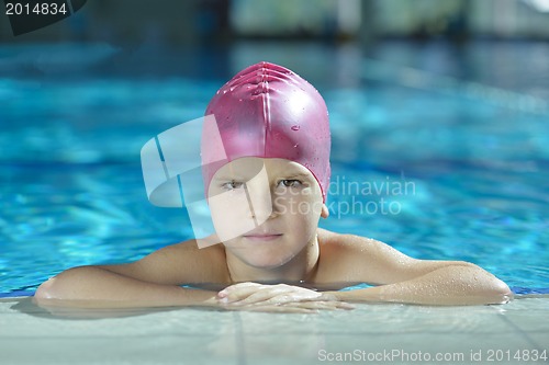Image of happy child on swimming pool