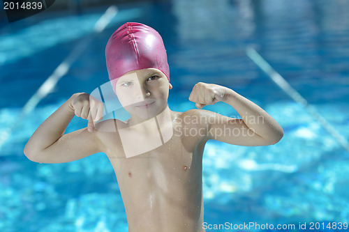 Image of happy child on swimming pool