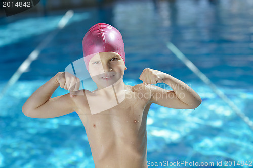 Image of happy child on swimming pool