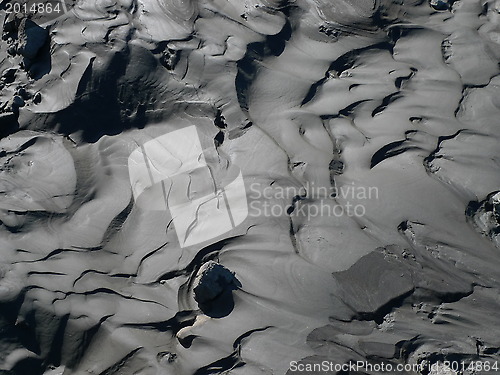 Image of black sand waves