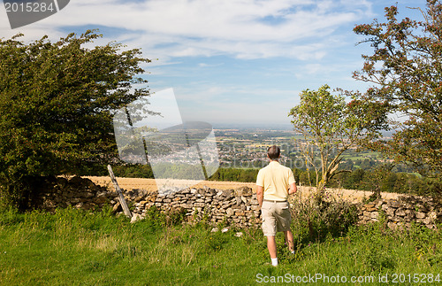 Image of Senior viewing over Winchcombe from Belas Nap