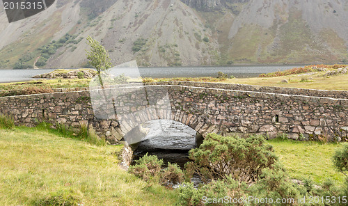 Image of Stone bridge over river by Wastwater