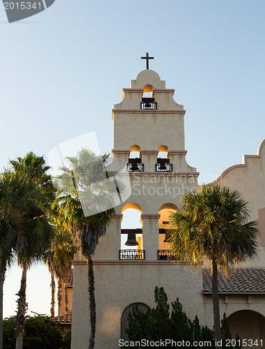 Image of Spanish mission style church tower sunset