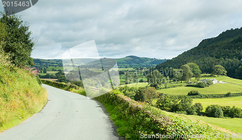 Image of Road leads to distance in Welsh valley