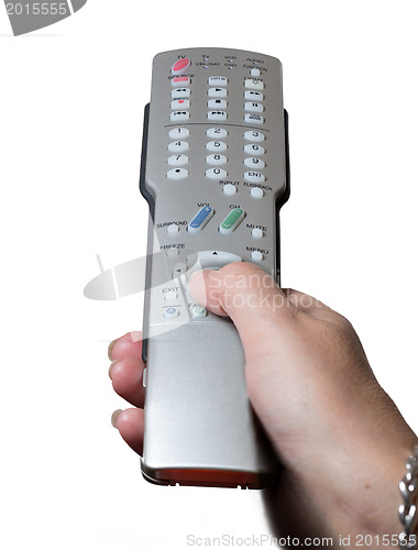 Image of Close up of TV remote control with hand